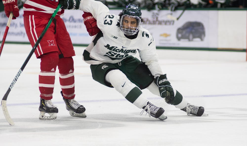 <p>Spartans junior forward Jagger Joshua in their hockey game against the Miami Redhawks. Michigan State earned a win in the third period, 3-1, on Friday, Oct. 15, 2021. </p>