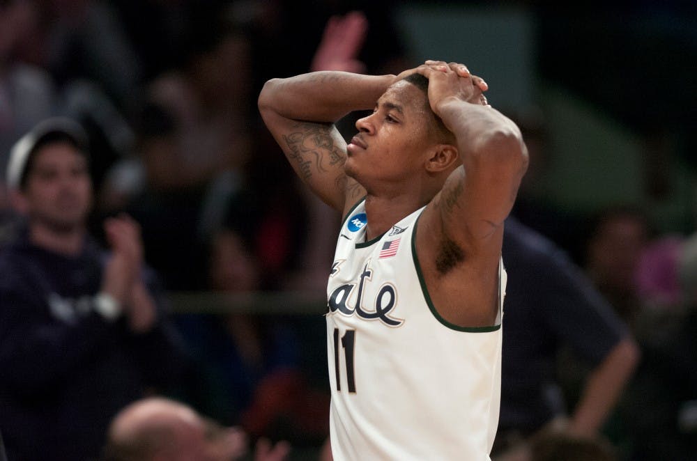 <p>Senior guard Keith Appling reacts to a foul called against him towards the end of the game against Connecticut on March 30, 2014, at Madison Square Garden in New York City. The Spartans lost in the Elite Eight, 60-54.&nbsp;State News File Photo</p>