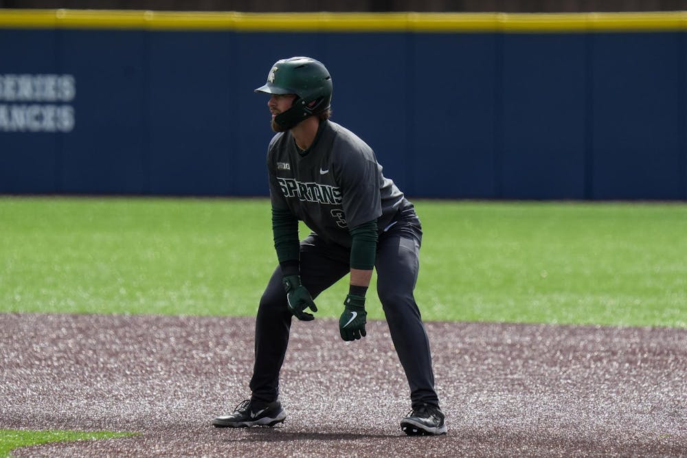 Michigan State graduate student Caleb Berry leads off on first base on April 26, 2025. 