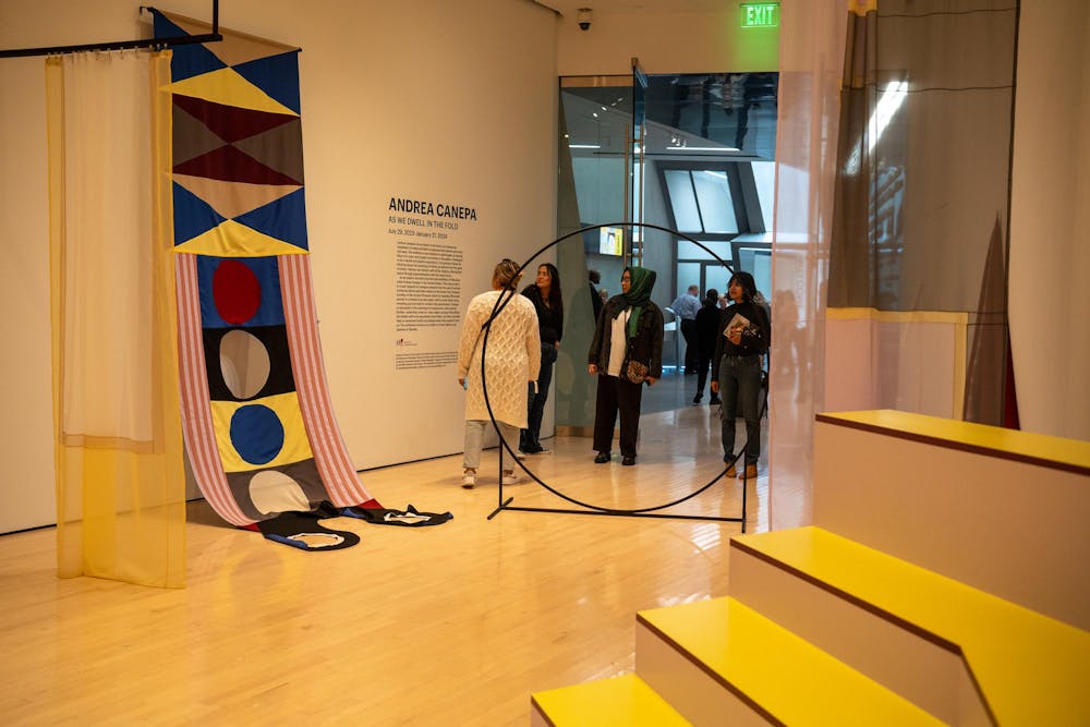 Museumgoers visit Andrea Canepa’s: As we dwell in the fold, exhibit at the MSU Broad Art Museum on Sept. 8, 2023. 