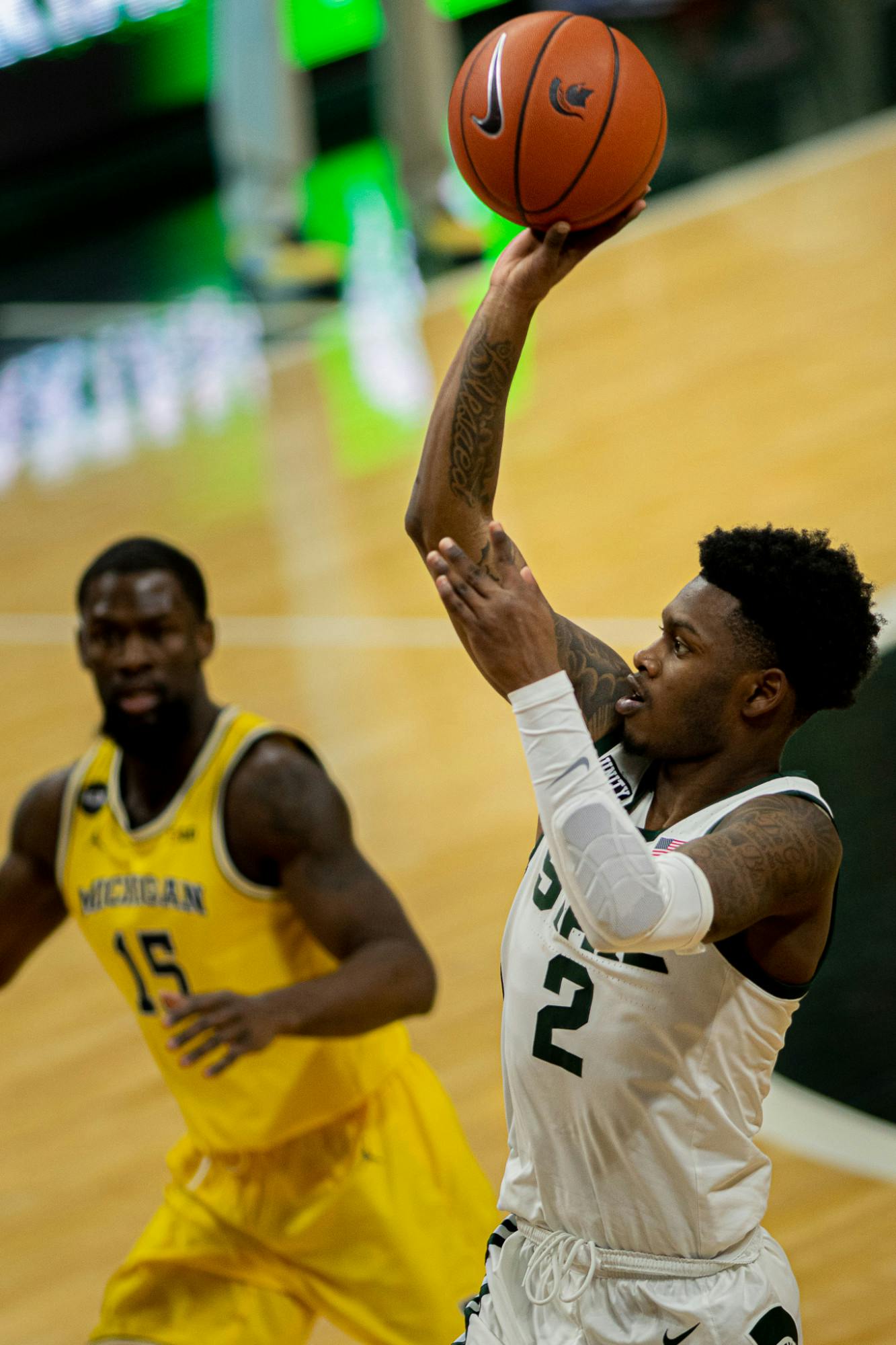 <p>Sophomore guard Rocket Watts (2) shoots a floater during the Spartans&#x27; 70-64 upset on the No. 2 Wolverines on March 7, 2021. Watts led all players in scoring with 21 points.</p>