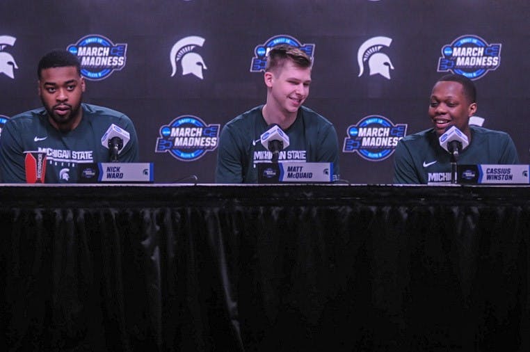 <p>Junior forward Nick Ward (44), left, senior guard Matt McQuaid (20), center, and junior guard Cassius Winston(5), right, speak at a press conference at the Capital One Arena in Washington DC on March 28, 2019. Michigan State is scheduled to face Louisiana State University on March 29, 2019.</p>