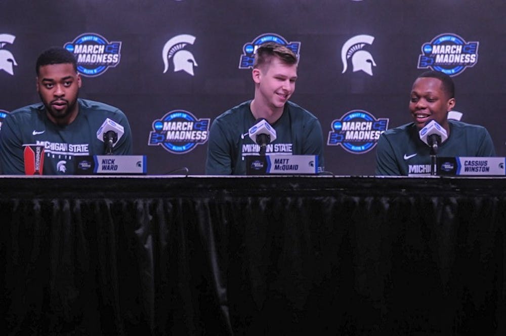 <p>Junior forward Nick Ward (44), left, senior guard Matt McQuaid (20), center, and junior guard Cassius Winston(5), right, speak at a press conference at the Capital One Arena in Washington DC on March 28, 2019. Michigan State is scheduled to face Louisiana State University on March 29, 2019.</p>