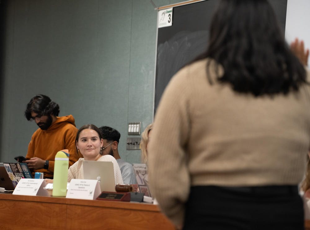 <p>Associated Students of Michigan State University (ASMSU) former Vice President of Government Affairs Josie Danielkiewicz reacts to the inauguration of her successor, political science senior Lily Wenkel during their Sept. 26, 2024 General Assembly meeting. The ASMSU General Assembly is a legislative body of college-elected representatives from different colleges, organizations, and councils on the Michigan State University campus.</p>