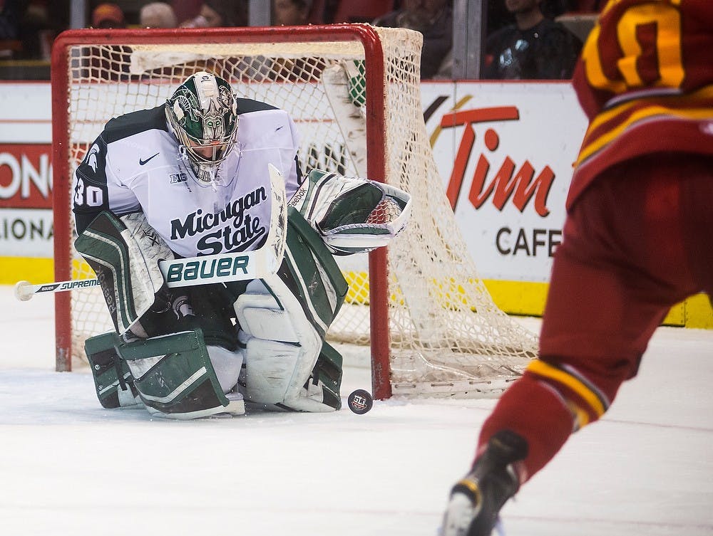 <p>Junior goaltender Jake Hildebrand tends the net during the game against Ferris State on Dec. 28, 2014, during the 50th Great Lakes Invitational at Joe Louis Arena in Detroit. The Spartans defeated the Bulldogs, 2-0. Danyelle Morrow/The State News</p>