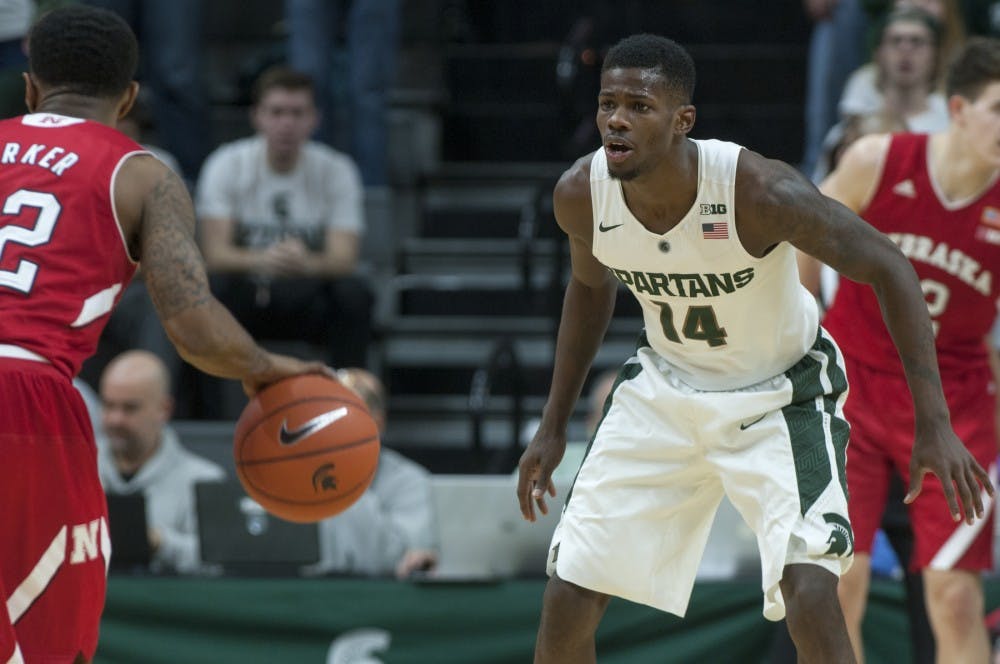 Junior guard Eron Harris goes in to block Nebraska guard Benny Parker as he dribbles the ball to the net during game against Nebraska on Jan. 20, 2016 at Breslin Center. The Spartans were defeated by the Cornhuskers, 72-71.