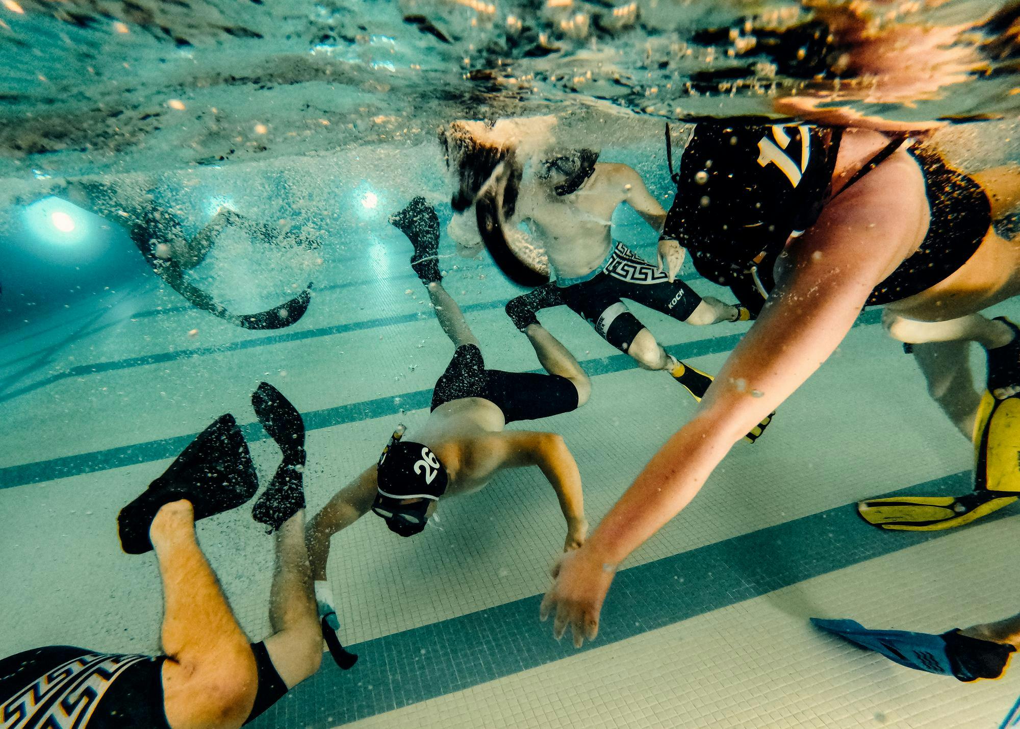 <p>Members of the underwater hockey club practice at IM Circle on Oct. 3, 2024. The club originated at MSU in 2003 and participates in tournaments around the country.</p>