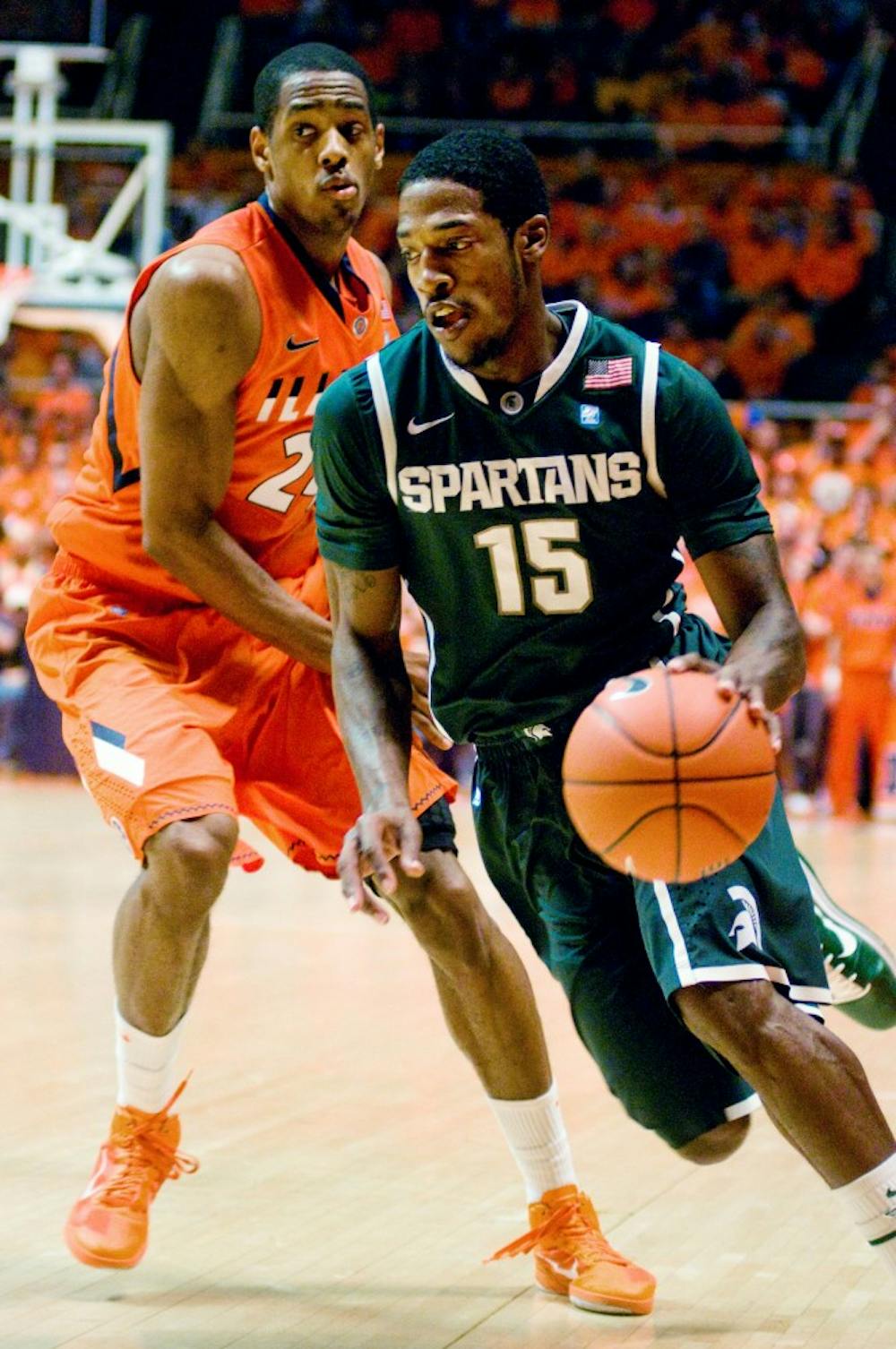 Senior guard Durrell Summers takes the ball toward the net during the Spartans' game against Illinois Tuesday at Assembly Hall in Champaign, Ill.