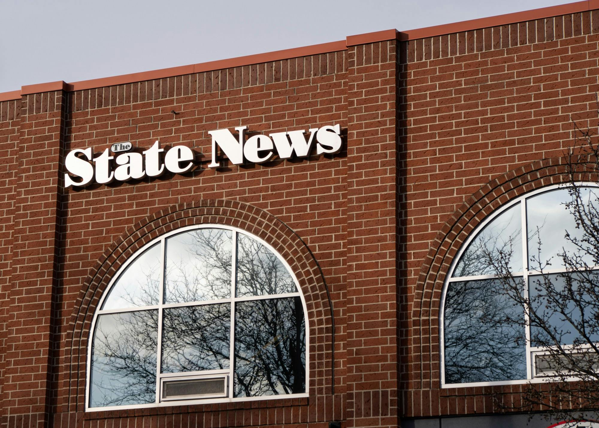 The State News building sign on Grand River Avenue.