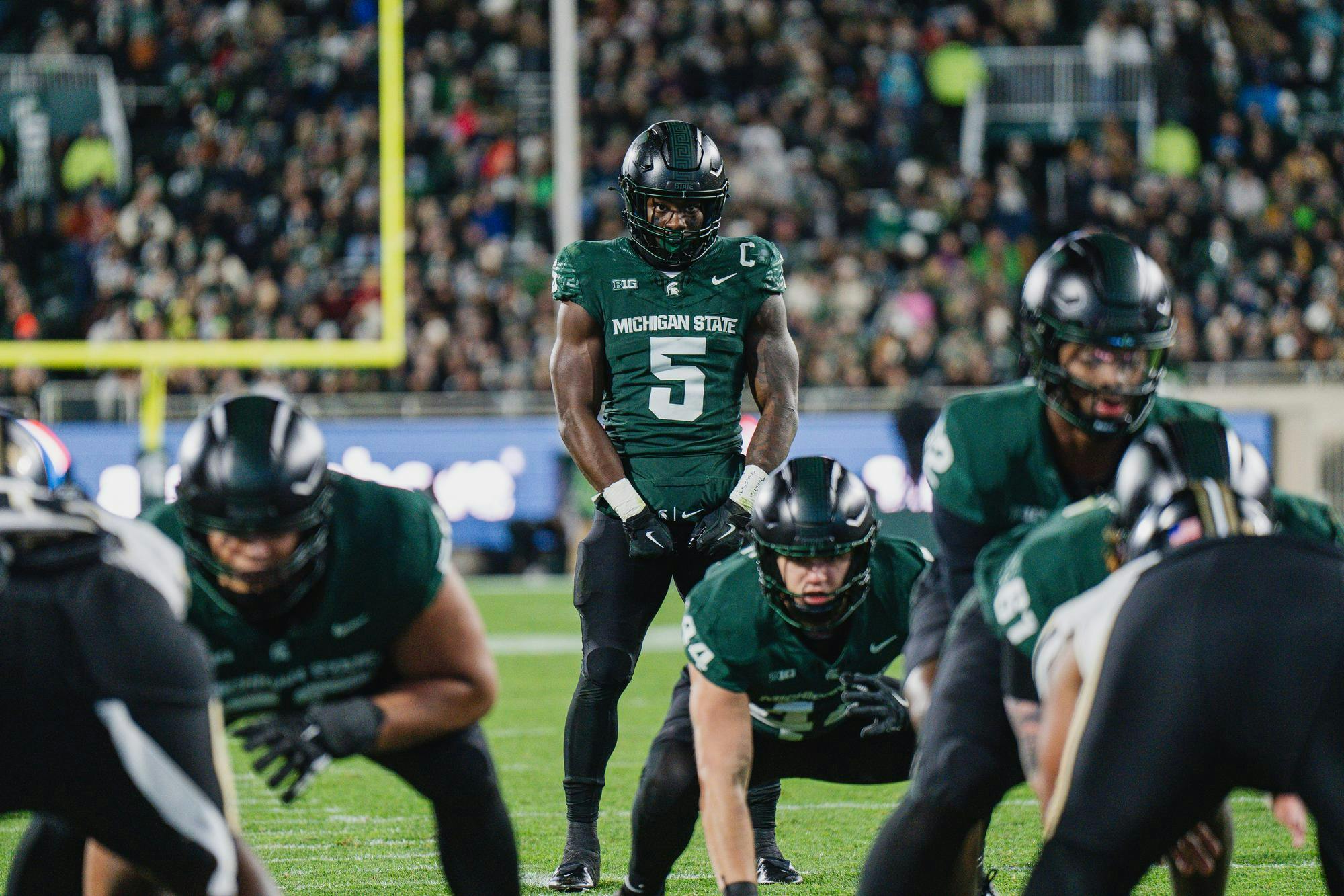 <p>MSU senior running back Nate Carter (5) stares down the end zone before running a play against Purdue at Spartan Stadium on Nov. 22, 2024.</p>