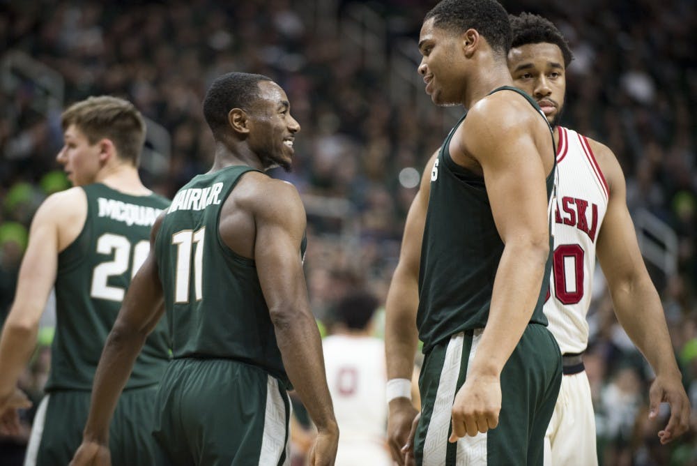 Freshman guard/forward Miles Bridges (22) shares a moment with junior guard  Lourawls 'Tum Tum' Nairn Jr. during the second half of men's basketball game against the University of Nebraska on Feb. 23, 2017 at Breslin Center. The Spartans defeated the Cornhuskers, 88-72.