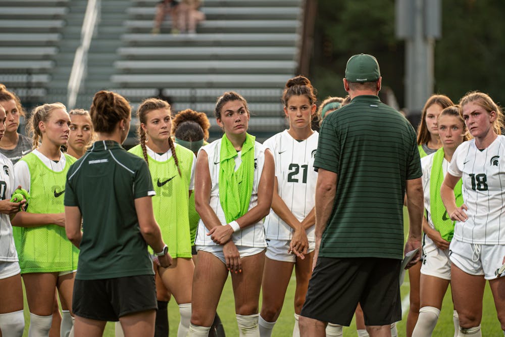 Michigan State Head Coach Jeff Hosler addresses his team, photo courtesy of MSU Athletics and Maria Babcock.