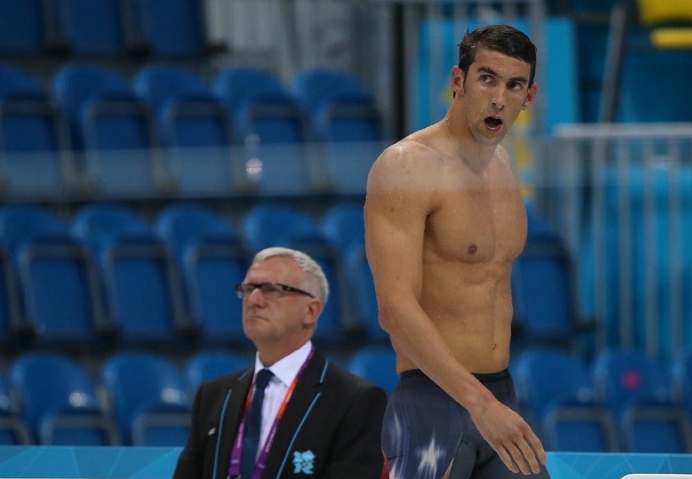 Michael Phelps of the United States looks to the scoreboard after a fourth-place finish in the 400m Individual Medley during the 2012 Summer Olympics at the Aquatics Centre on Saturday, July 28, 2012 in London, England. (Robert Gauthier/Los Angeles Times/MCT)