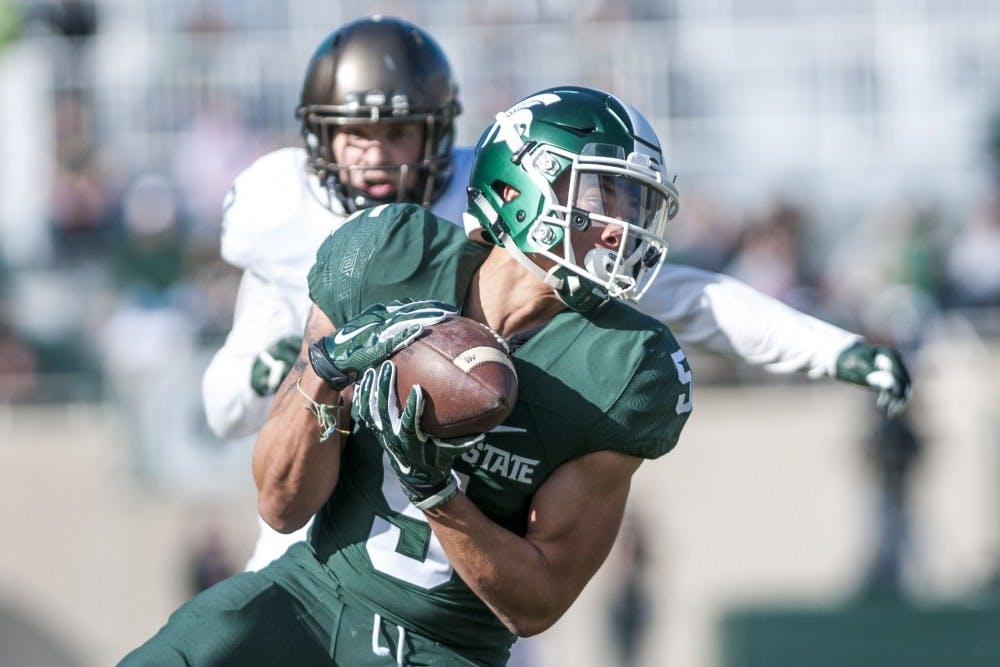 Freshman wide receiver Hunter Rison (5) catches the ball during the Green and White Spring Game on April 1, 2017 at Spartan Stadium. The White team defeated the Green team, 33-23.