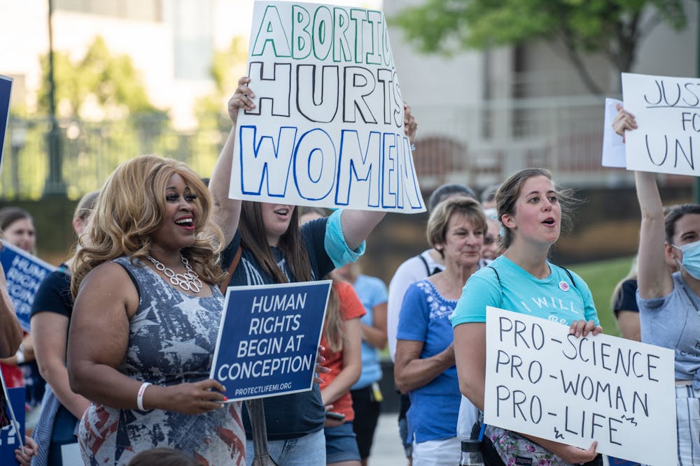 <p>Anti-Abortion supporters gather outside the Michigan Hall of Justice to celebrate the overturning of Roe v. Wade and rally to continue the fight to end abortion on June 24, 2022.</p>
