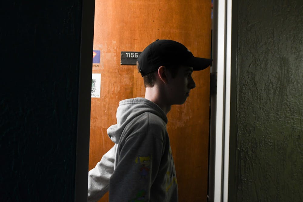 Elijah McKown leaving his his room in Hubbard Hall on February 26, 2020. 