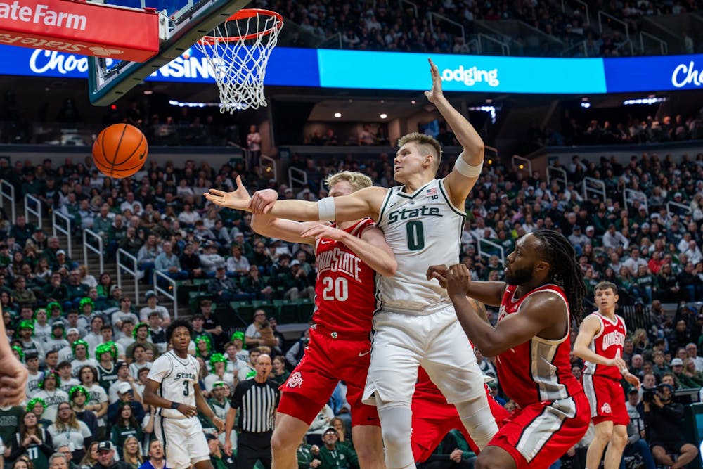 Michigan State forward Jaxon Kohler (0) goes up for a rebound during Michigan State’s game against Ohio State at Breslin Student Events Center in East Lansing, Mich., on Sunday, Feb. 22, 2026.