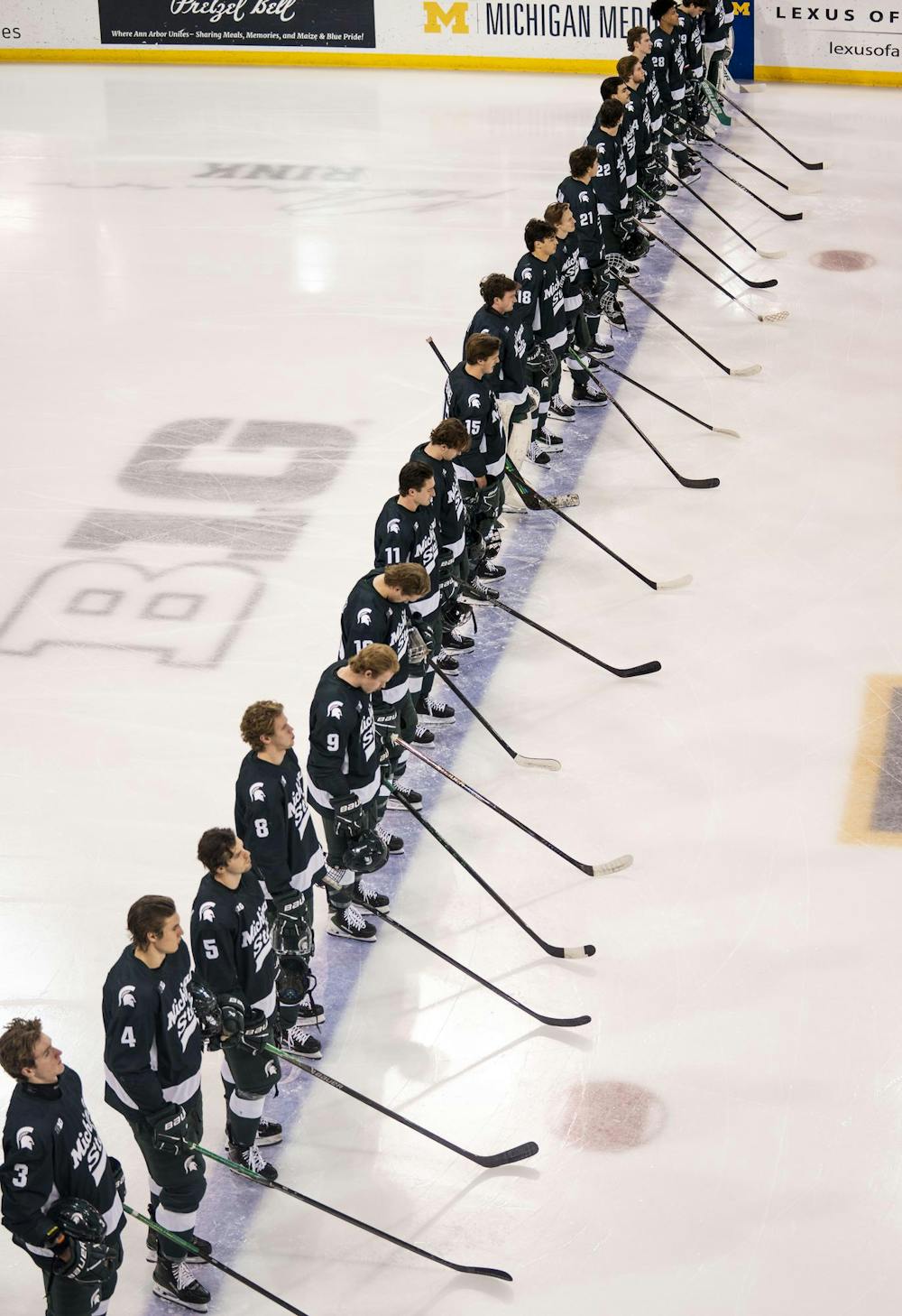 <p>Michigan State men's hockey players line up at the blue line before their game against the University of Michign at the Yost Ice Arena in Ann Arbor, Mich. on Dec. 6, 2025.</p>