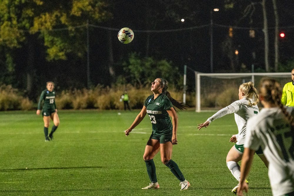 <p>Michigan State University freshman forward Bella Najera watches the ball go up at the NCAA first tournament at DeMartin Soccer Complex on Nov. 10th, 2023. </p>