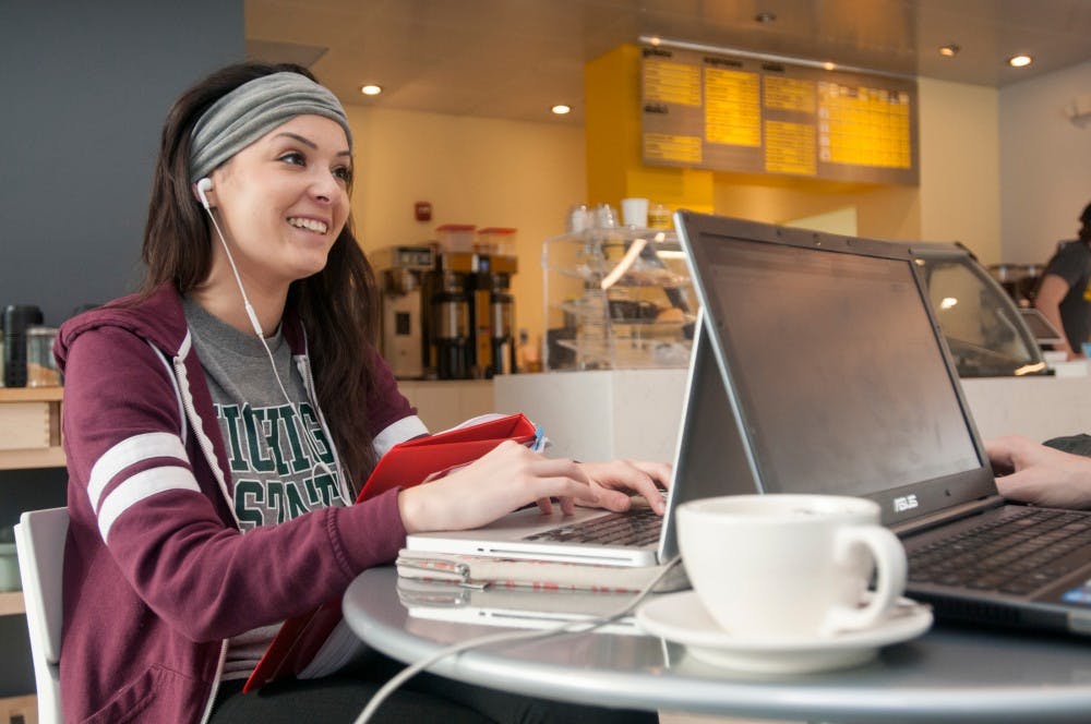 Biomedical laboratory science senior Maryssa Trupiano studies for her final exams on Dec. 8, 2015 at Iorio's Gelateria, 1034 Trowbridge Road, in East Lansing. She said that she usually studies in her dorm in Brody, but came out to Iorio's because she heard that they were giving out free coffee to students. 