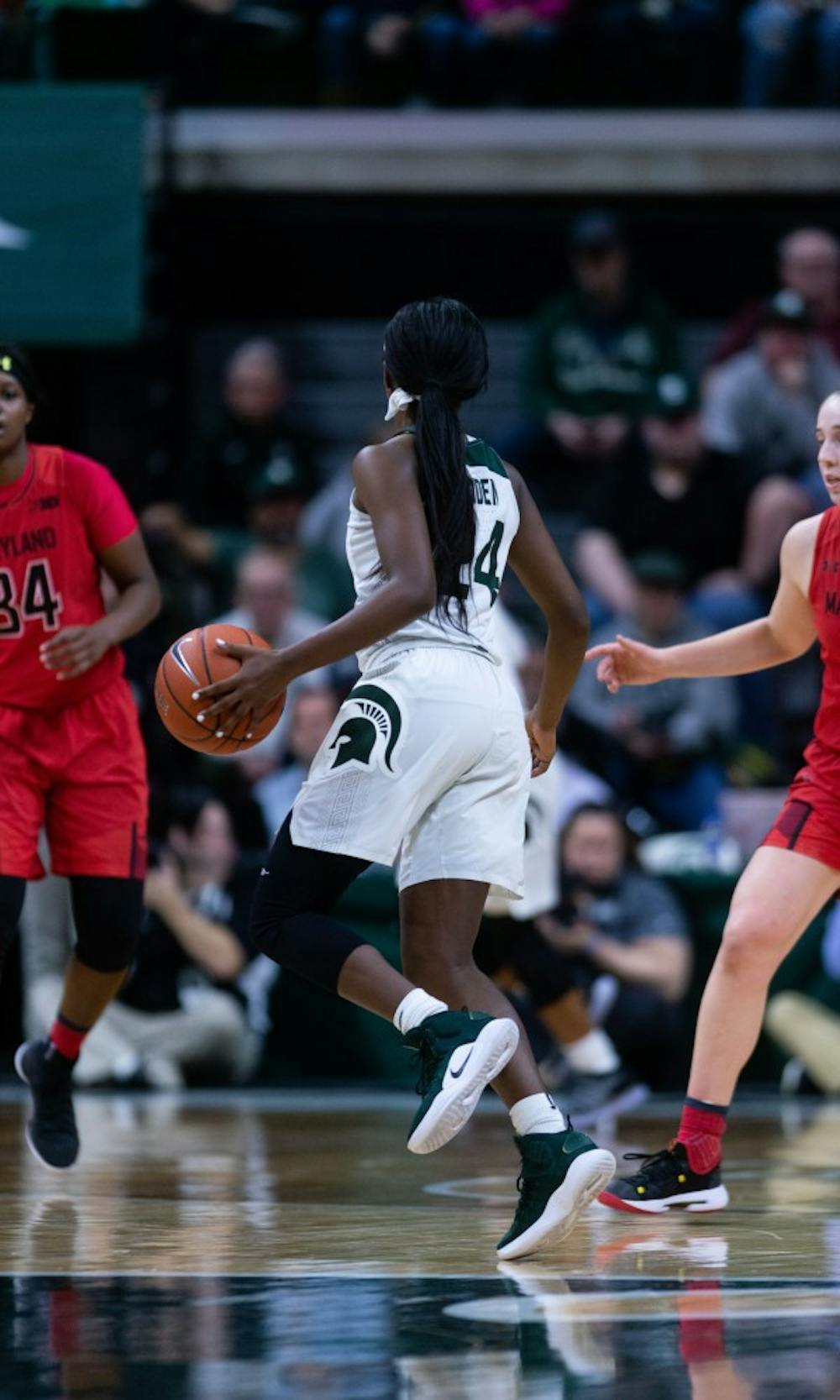 <p>Freshman guard Nia Clouden carries the ball up court during the game against Maryland at the Breslin Center on Jan. 17, 2019. The Spartans defeated the Terrapins, 77-60.</p>