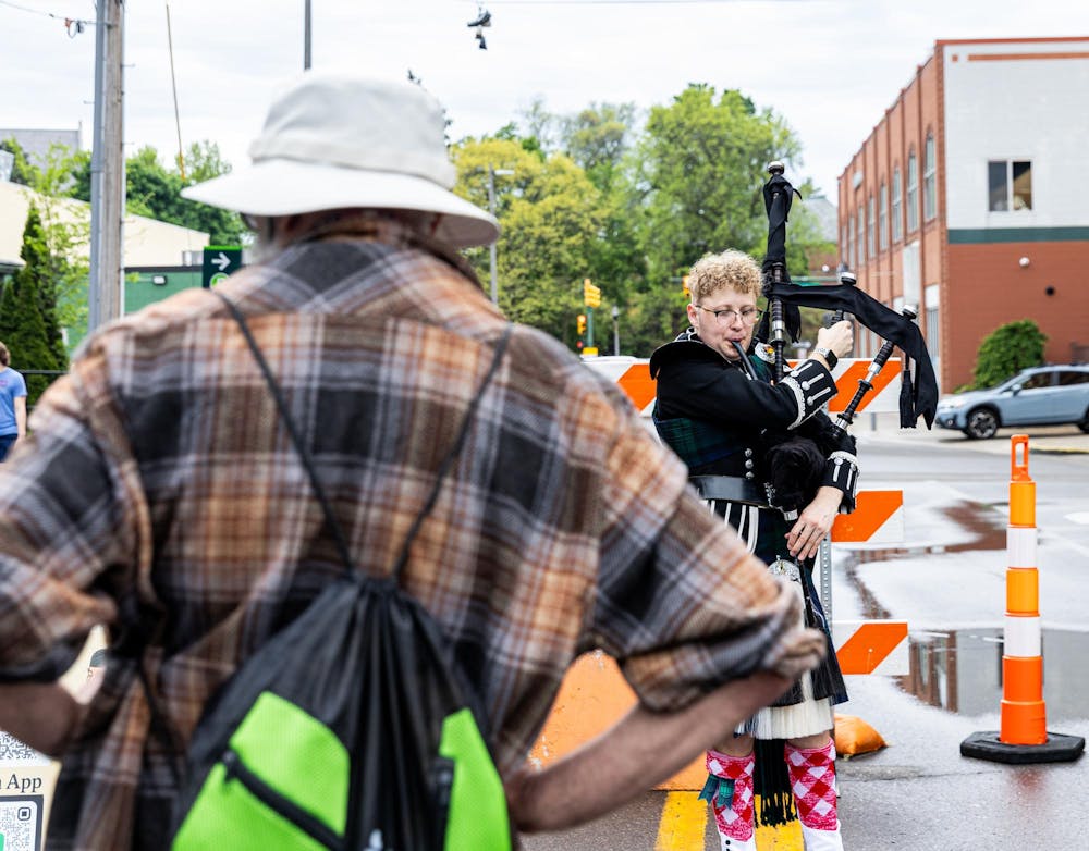 <p>Michigan State student and composer John Danziger plays the bagpipe during the 63rd East Lansing Art Festival in East Lansing, Mich., on May 16, 2026.</p>