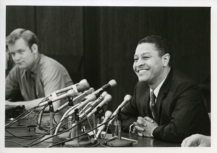 Clifton Wharton speaks at his first MSU press conference in 1969. Photo from MSU Archives and Historical Collections. 