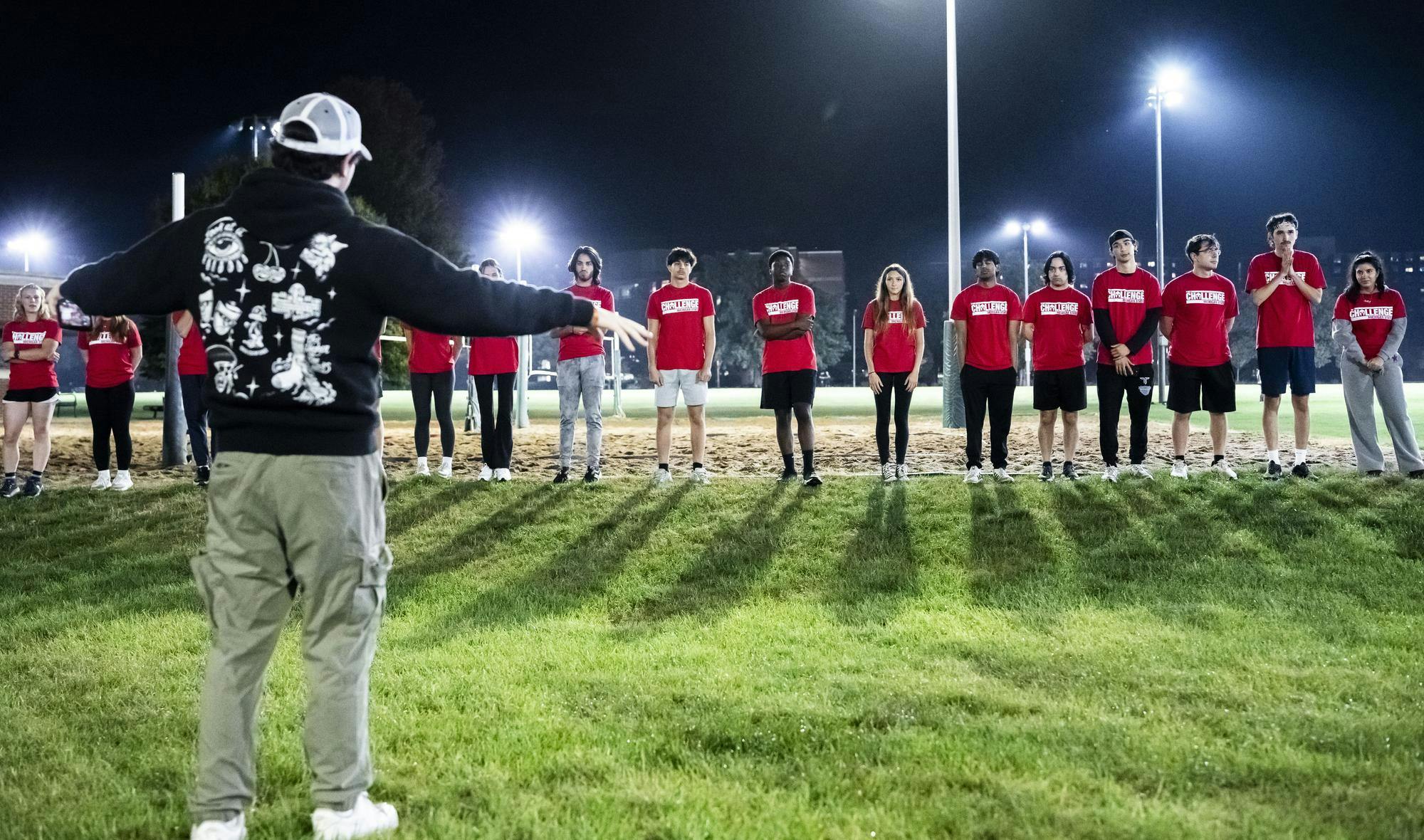 <p>The president of The Challenge MSU Matthew Metrick explains this week’s competition to the Challenge club members at IM East field on Sept. 24, 2025. Every week players compete until there is one left standing winning the grand $1,000 prize.</p>