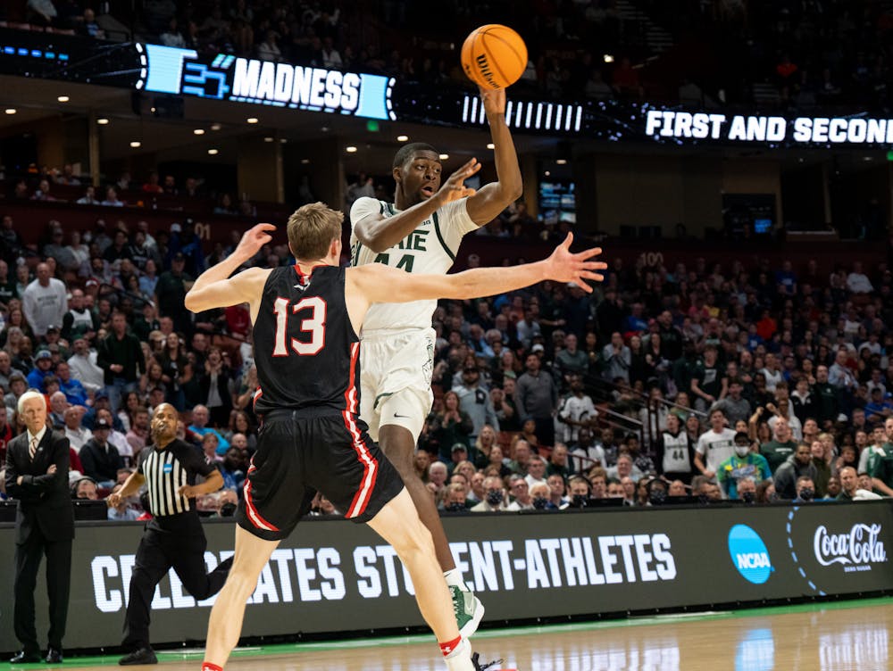 <p>Senior forward Gabe Brown (44) attempts to pass the ball during Michigan State&#x27;s win over the Davidson Wildcats on March 18, 2022.</p>
