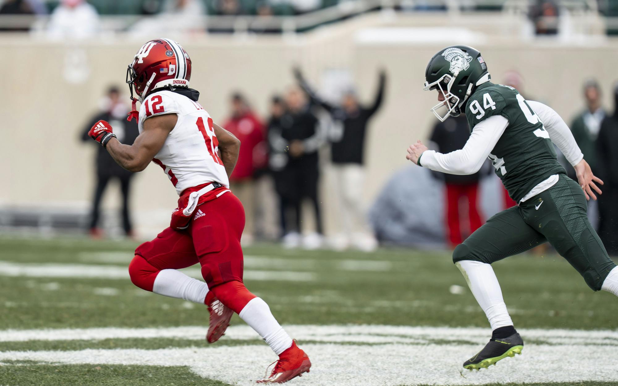 Jaylen Lucas, 12, runs ahead of Michigan State for a Hoosier touchdown during MSU’s game against Indiana on Saturday, Nov. 19, 2022 at Spartan Stadium. The Hoosiers ultimately beat the Spartans, 39-31.