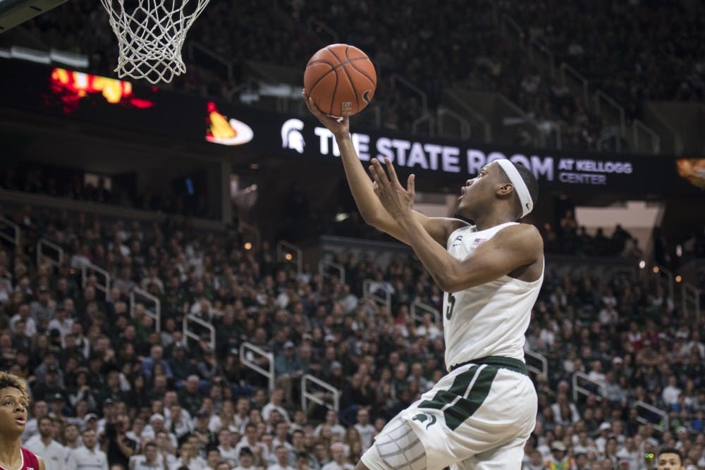 Junior guard Cassius Winston (5) shoots a layup during the men's basketball game against Indiana on Feb. 2, 2019 at Breslin Center. Michigan State lost to Indiana in overtime 79-75. Nic Antaya/The State News