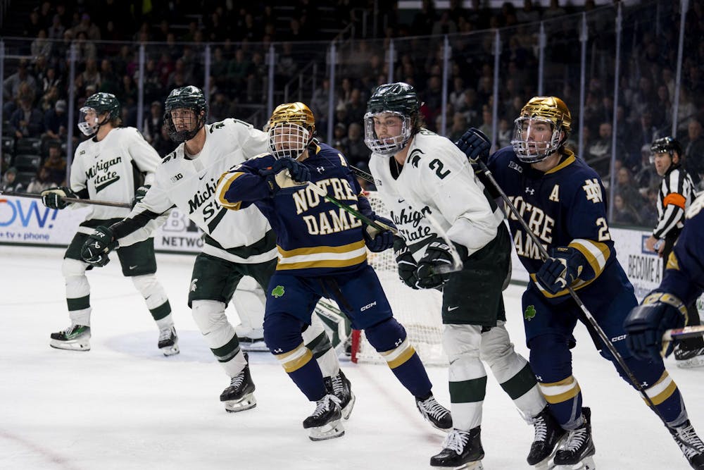 <p>Michigan State University and Notre Dame University men’s ice hockey places watch for the puck at Munn Ice Arena on Nov. 16, 2024. MSU defeated Notre Dame 4-3.</p>