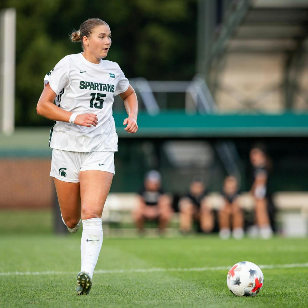 <p>Michigan State Jr. D, Julia Belli (15), runs with the ball across the field during a game in DeMartin Stadium in East Lansing, Mich., on Aug. 12, 2026.</p>