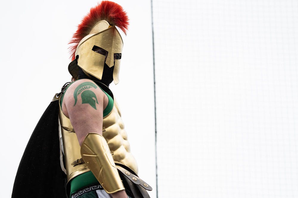 <p>A Michigan State fan stands in the audience at at McLane Stadium on May 17, 2025. The Spartans won 11-10 in a walk-off home run in the ninth inning to close the series.</p>