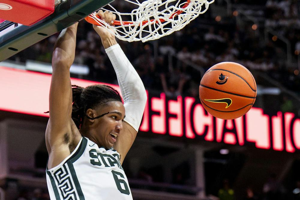 <p>Michigan State forward Jordan Scott (6) dunks a basket during the Michigan State vs. Incarnate Word men's basketball exhibition game at Breslin Center in East Lansing, Mich., on Friday, Oct. 2, 2026.</p>