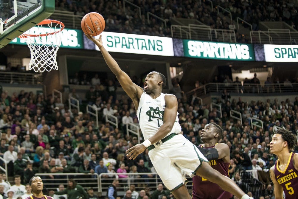 Freshman guard Joshua Langford (1) goes for a layup during the first half of the men's basketball game against Minnesota on Jan. 11, 2017 at Breslin Center.