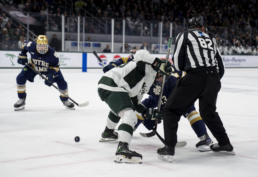 <p>Michigan State University and Notre Dame University contest a face-off at Munn Ice Arena on Nov. 16, 2024. MSU defeated Notre Dame 4-3.</p>