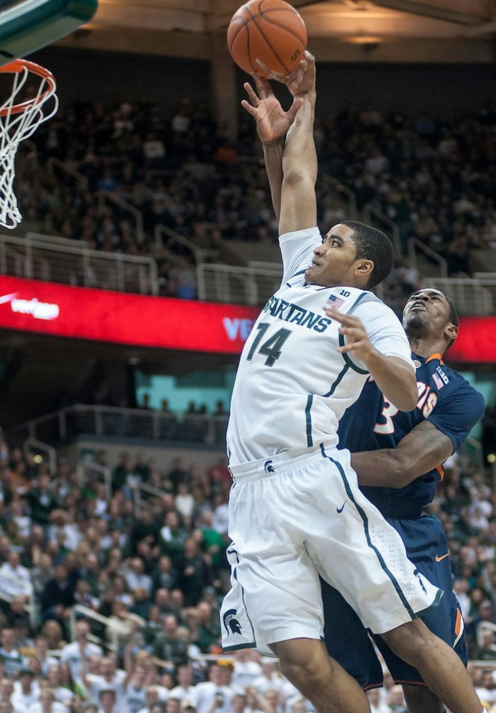 	<p>Illinois guard Brandon Paul blocks freshman guard Gary Harris in the second half of the game. The Spartans defeated the Fighting Illini,, 80-75, Thursday, Jan. 31, 2013, at Breslin Center. Justin Wan/The State News</p>