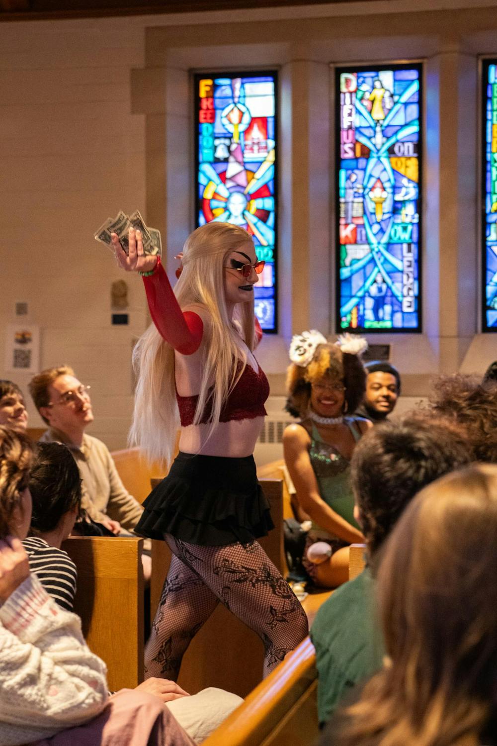 <p>Lansing drag artist whose stage name is Aloe Vera performs at the Alumni Memorial Chapter on April 13.</p>