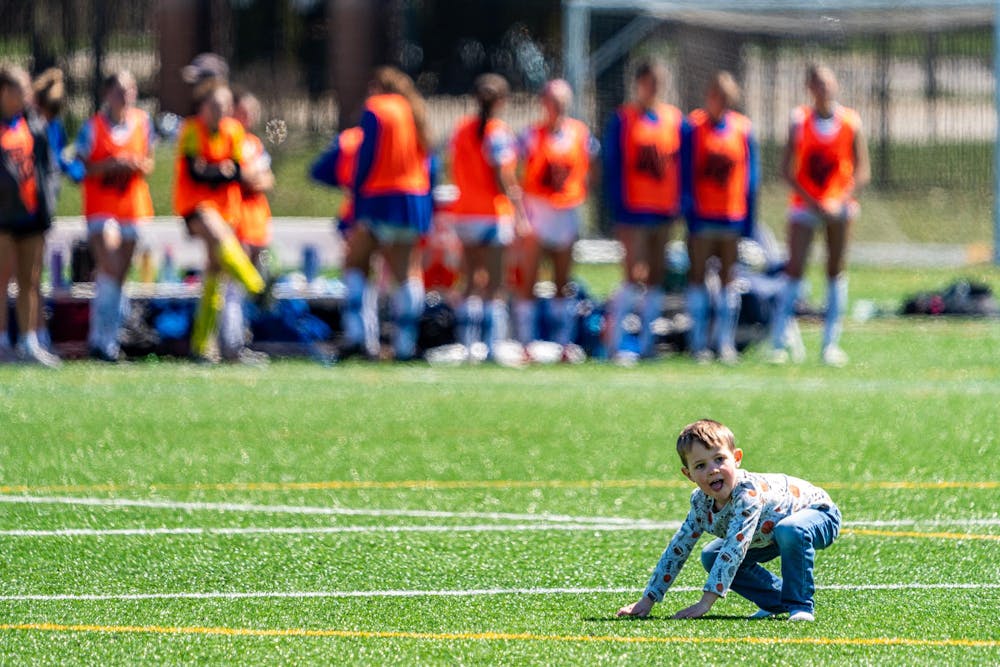 A young Michigan State fan runs on the field during halftime of the Michigan Spring Cup championship at the Spartan Greens Turf Complex in East Lansing, MI on April 11, 2026.