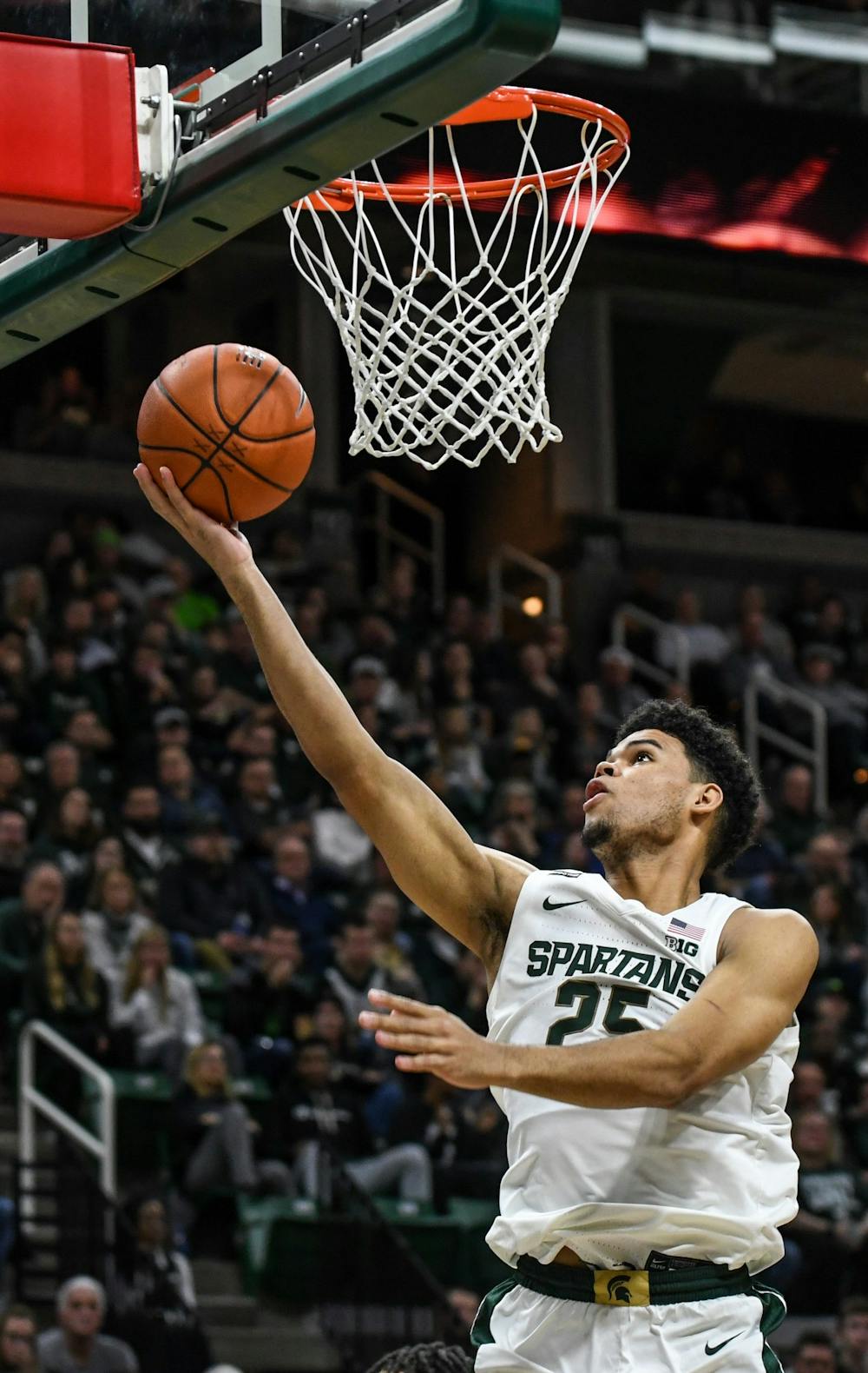 Freshman forward Malik Hall (25) lays up a basket during the game against Western Michigan Dec. 29, 2019 at the Breslin Center. The Spartans defeated the Broncos, 95-62.