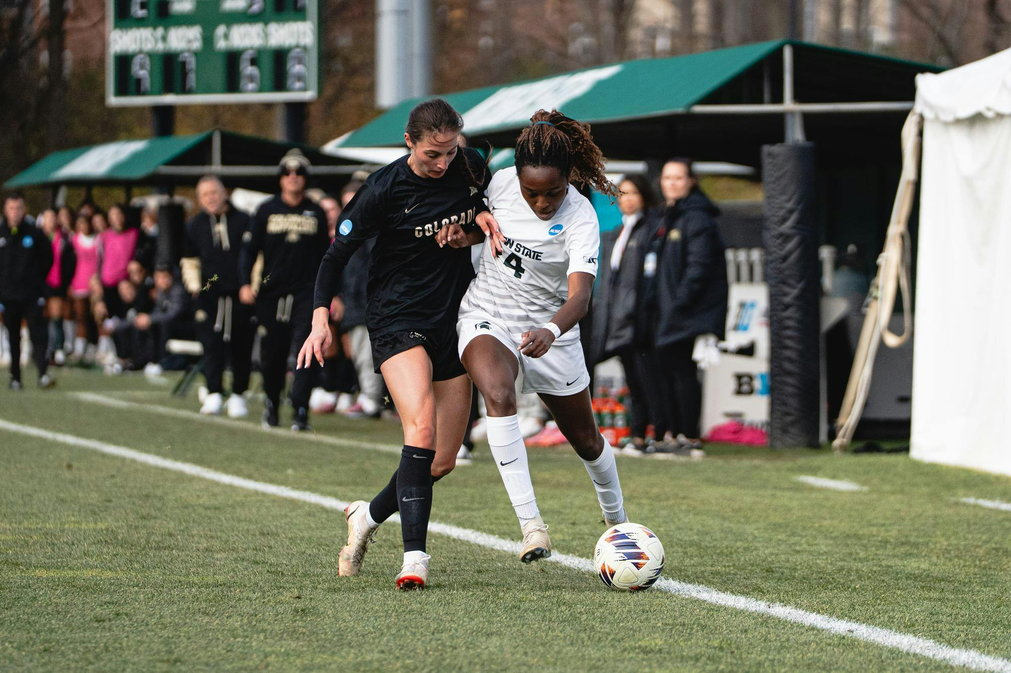 MSU junior forward Kennedy Bell dribbles the ball down the field at the DeMartin Soccer Complex in East Lansing, MI on Nov. 23, 2025