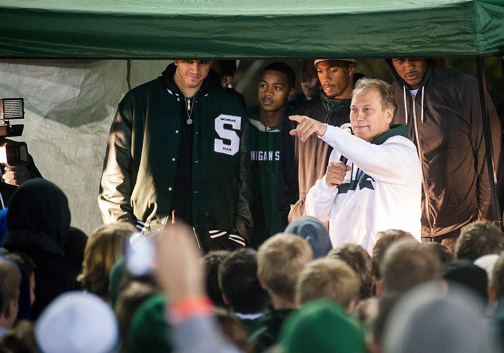 <p>Head coach Tom Izzo takes a question from the crowd during Izzone Campout on Friday night, Oct. 5, 2012 at Munn field.Justin Wan/The State News</p>
