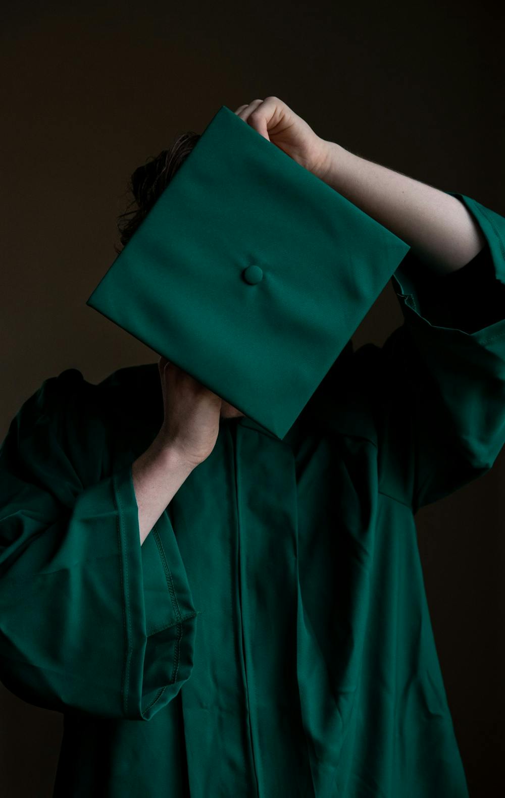 A graduation cap and gown photographed on April 22, 2020.