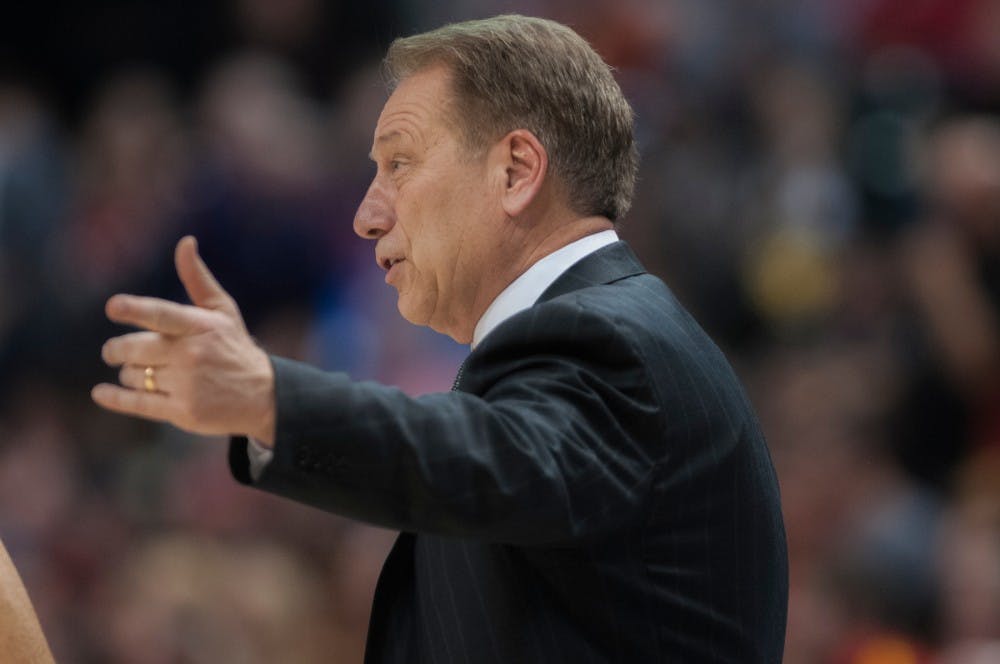 Head coach Tom Izzo talks to a referee during the second half of the game on March 12, 2016 at Bankers Life Fieldhouse in Indianapolis, Indiana. The Spartans defeated theTerrapins, 64-61. 