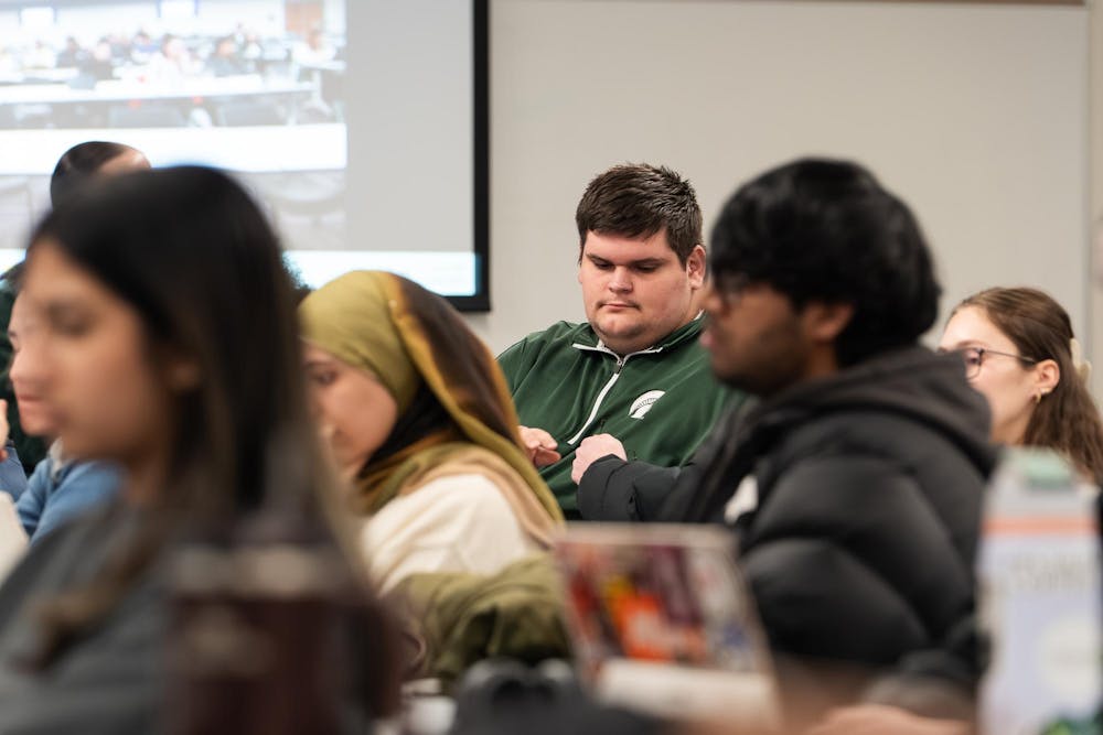 <p>General Assembly Member Jacob Mason prepares to address the ASMSU Board at the International Center in East Lansing, Michigan, on Jan. 22nd, 2026.</p>