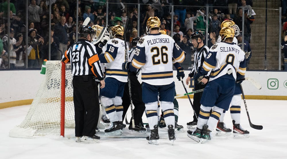 <p>Notre Dame gathers around their senior goaltender Ryan Bischel, who made a total of 36 saves in his shutout at Compton Family Ice Arena in Notre Dame, IN on Friday, March 3, 2023. Notre Dame will play the Spartans again on Saturday, March 4, 2023, for the second game of the series.</p>