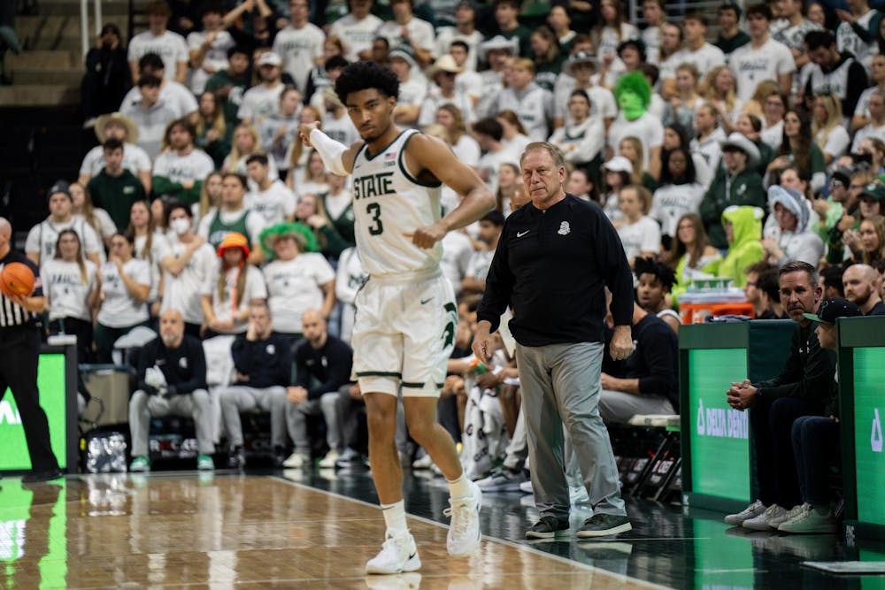 <p>MSU Head Coach Tom Izzo scowls following a sideline conference with Junior Guard Jaden Akins (3) during their game against Georgia Southern at the Jack Breslin Student Events Center on Nov. 28, 2023. Izzo's Spartan squad defeated Georgia Southern 86-55.</p>