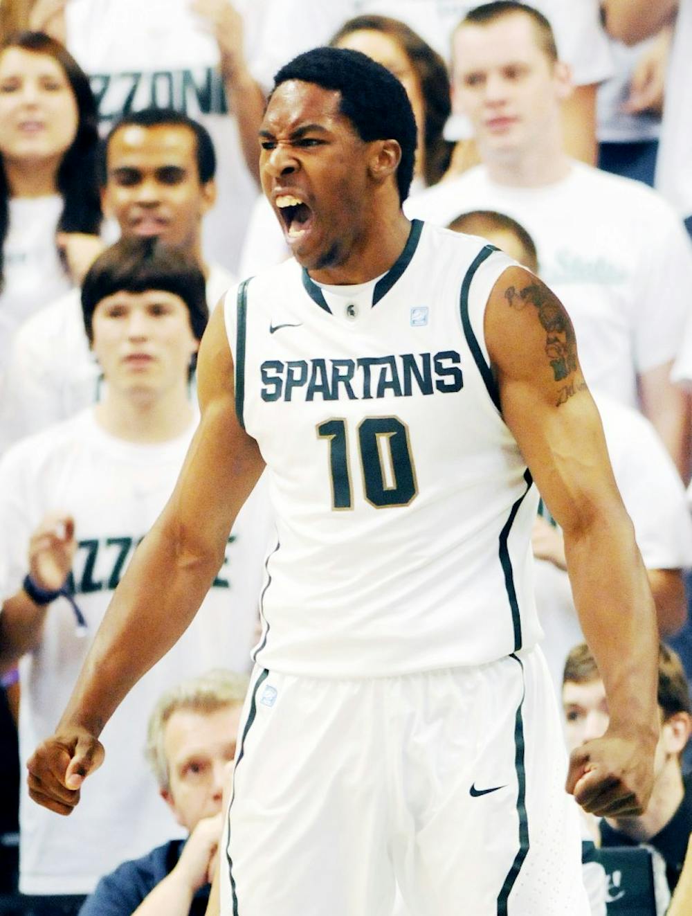 Junior forward Delvon Roe gets fired up after a play against Eastern Michigan. The Spartans defeated the Eagles, 96-66, on Nov. 12 at Breslin Center. Josh Radtke/The State News