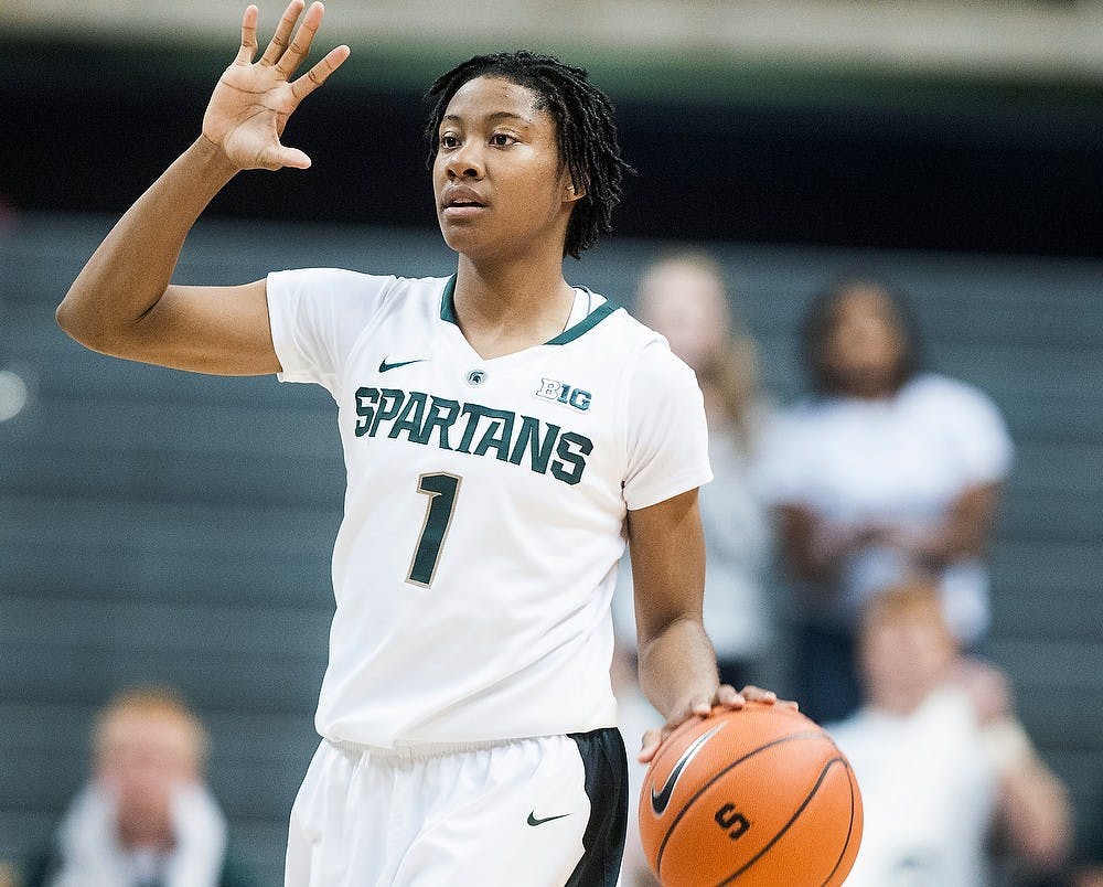 Senior guard Jasmine Thomas calls out a play against Saginaw Valley State Nov. 1, 2012, at the Breslin Center. The Spartans beat the Cardinals 74-35. Katie Stiefel/ State News